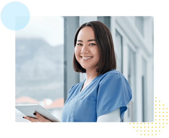 Smiling nurse with tablet
